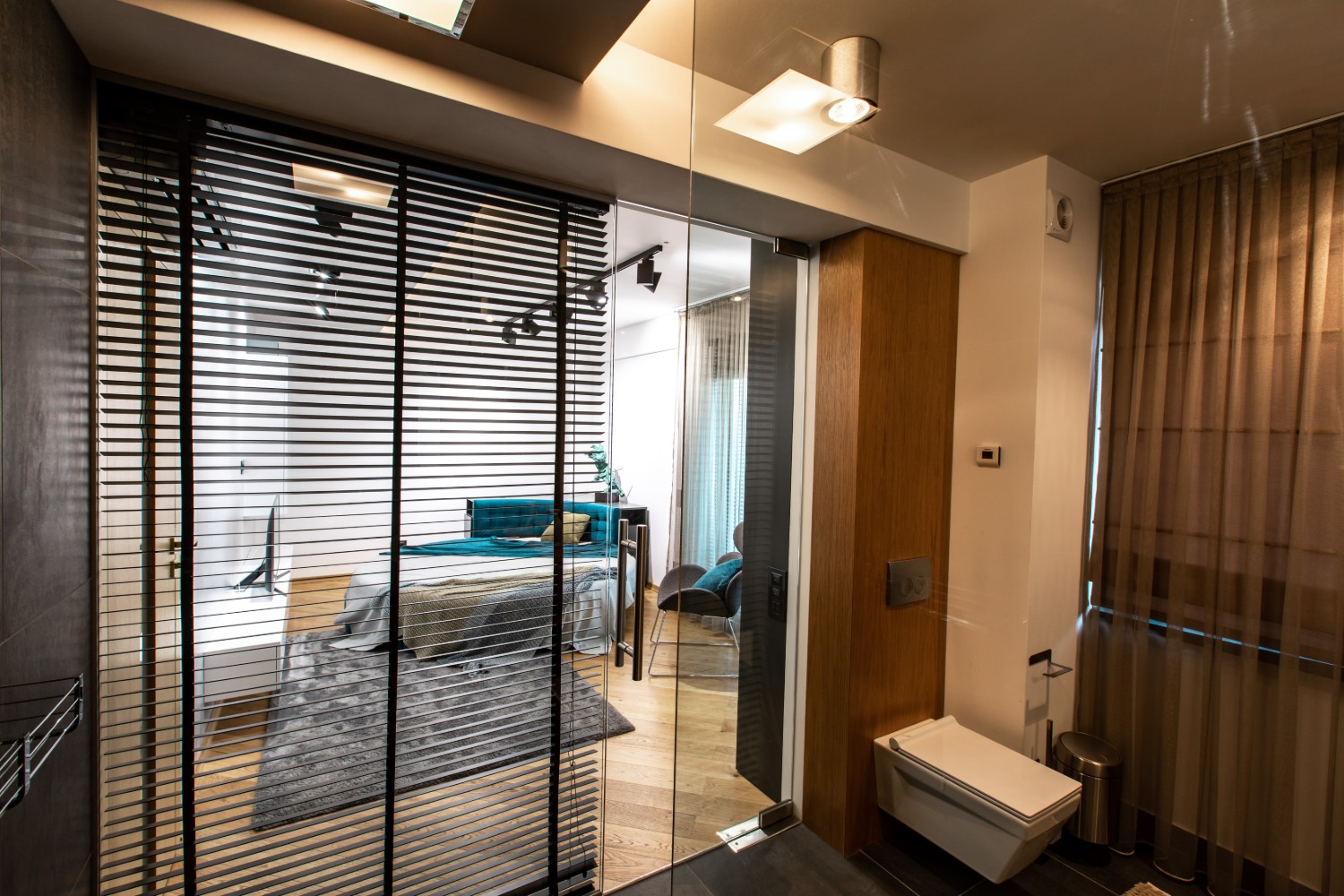 Apartament burlac Iasi - dormitor cu pat rotund - amenajare HighLight Project